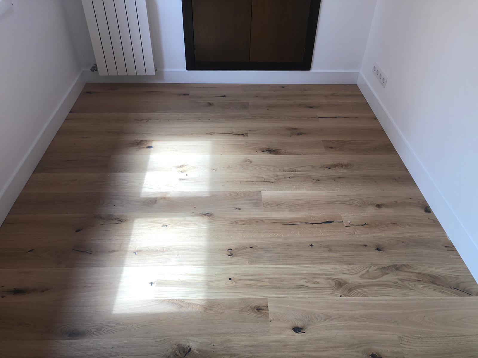Proyecto de cambio de suelo de tarima en una vivienda privada.